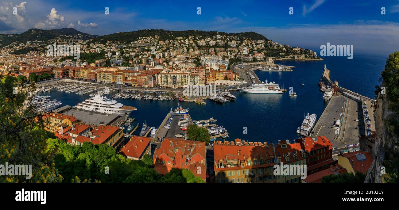 Nice, France - May 25, 2019: View of boats, coastline and traditional houses in Lympia port on the Mediterranean Sea, Cote d'Azur in Nice, France Stock Photo