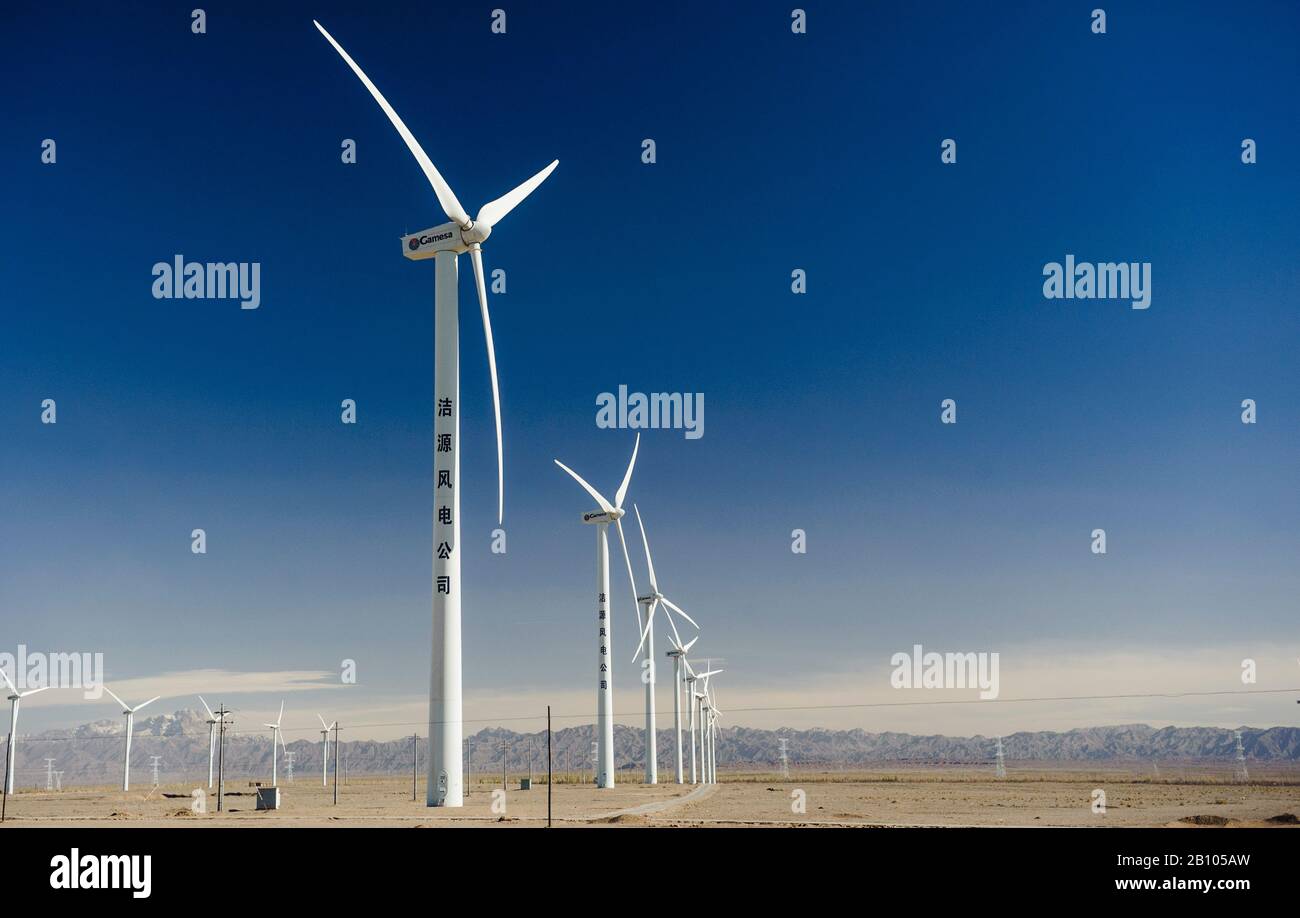 Wind farms of the desert regions of  Xinjiang, China Stock Photo