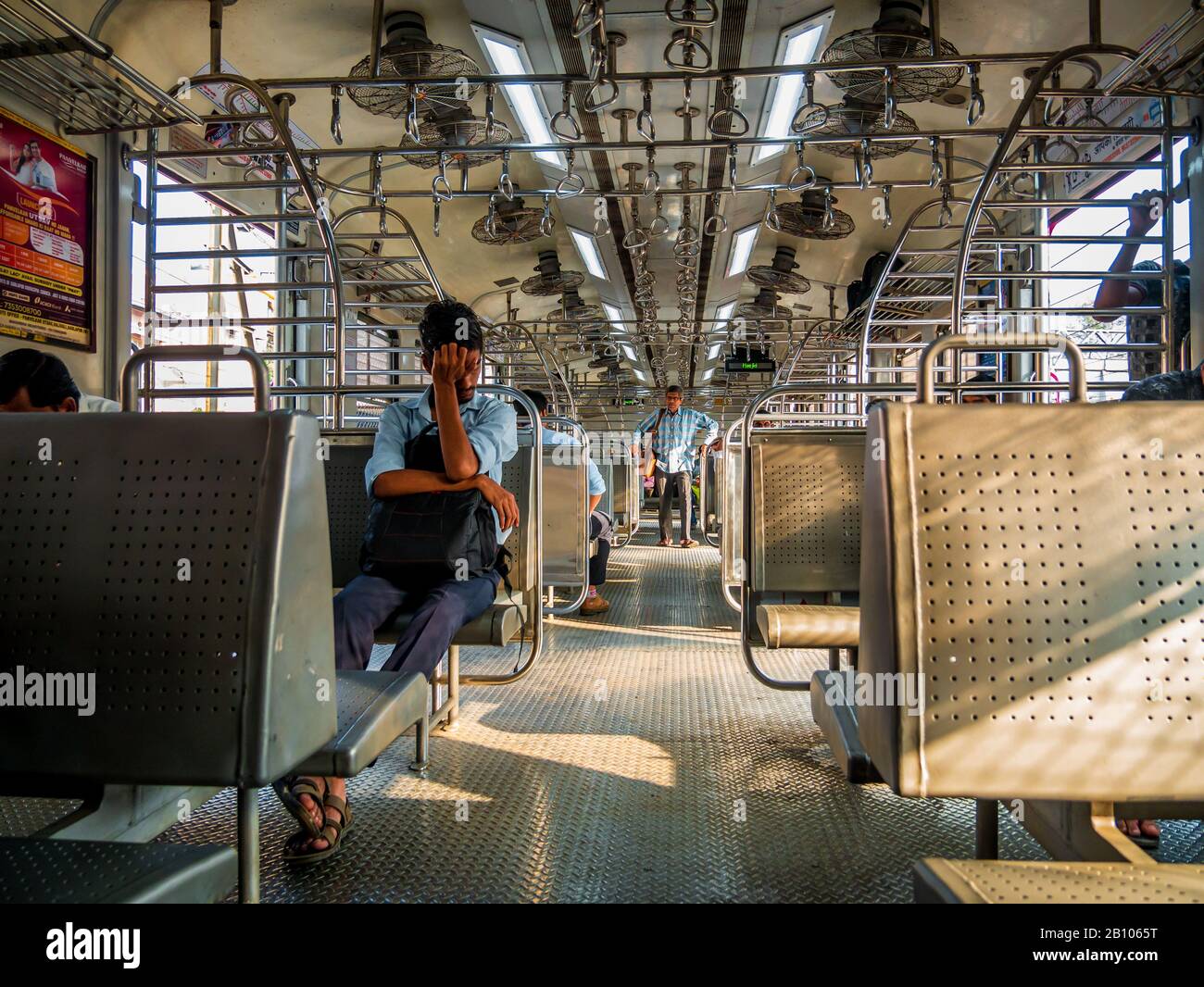 Mumbai, India - December 18, 2019 : Unidentified passengers inside Indian Railway local train on westerna railway line. Indian Railways carries about Stock Photo