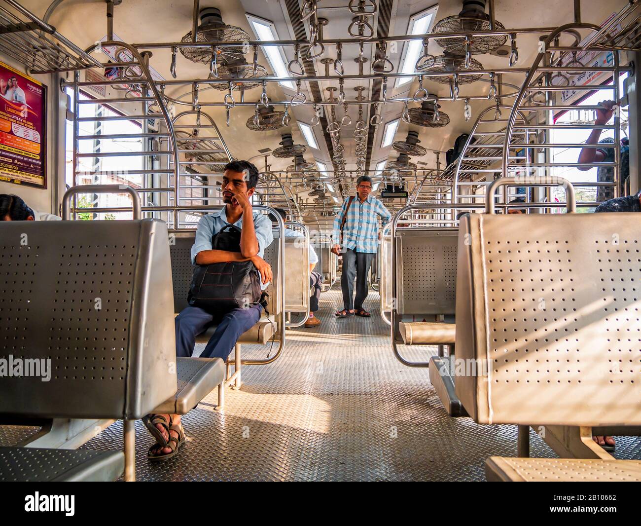 Mumbai, India - December 18, 2019 : Unidentified passengers inside Indian Railway local train on westerna railway line. Indian Railways carries about Stock Photo
