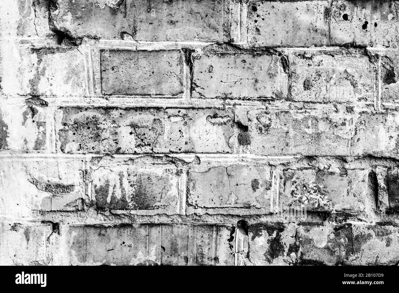 Texture, brick, wall, it can be used as a background. Brick texture with scratches and cracks Stock Photo