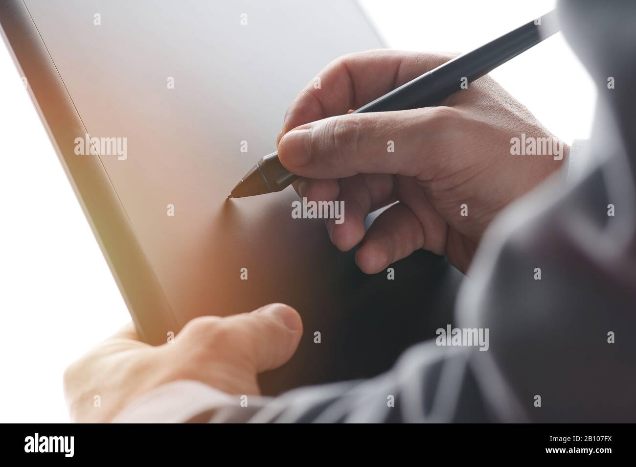 Working on online document with tablet close up view Stock Photo