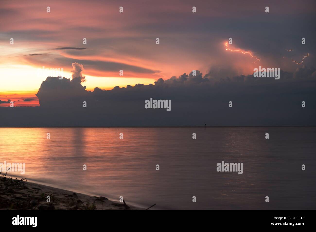 Sunset storm with crawlers over Lake Maracaibo (Catatumbo thunderstorm, the place with the highest lightning density on earth) Ologa, Zulia, Venezuela, South America Stock Photo