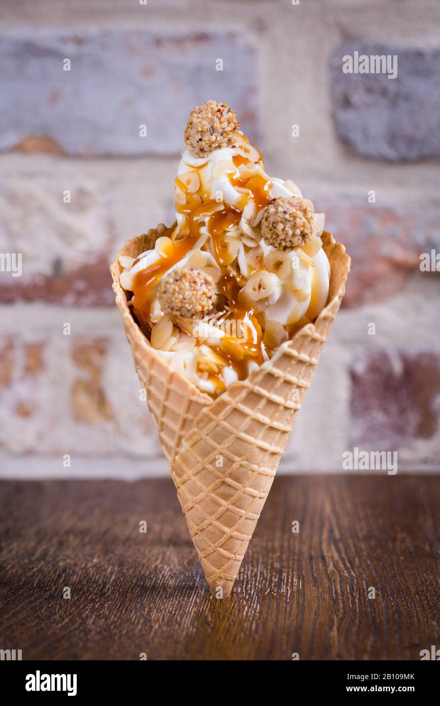 Frozen yogurt in a waffle Stock Photo Alamy
