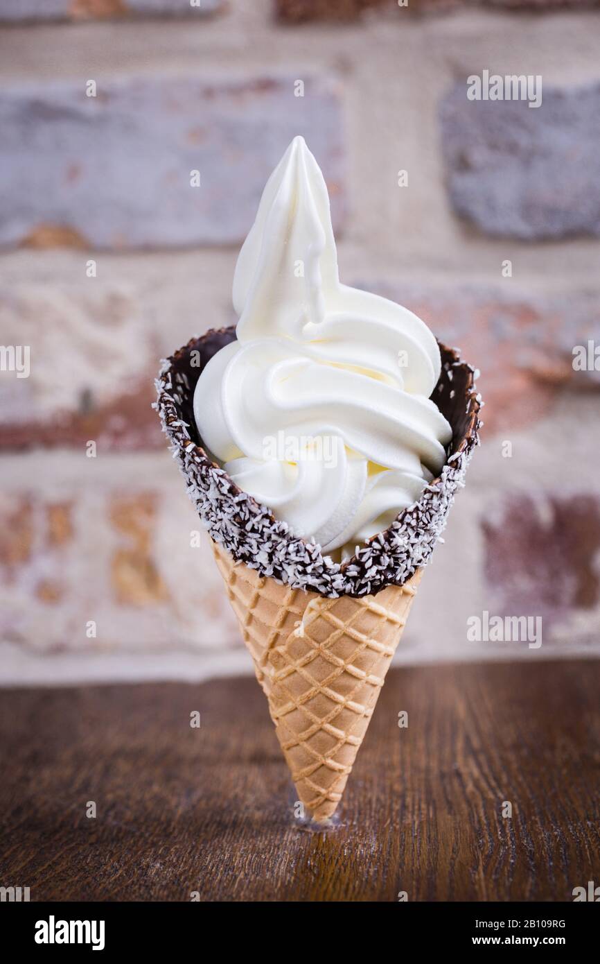 Frozen yogurt in a waffle Stock Photo Alamy