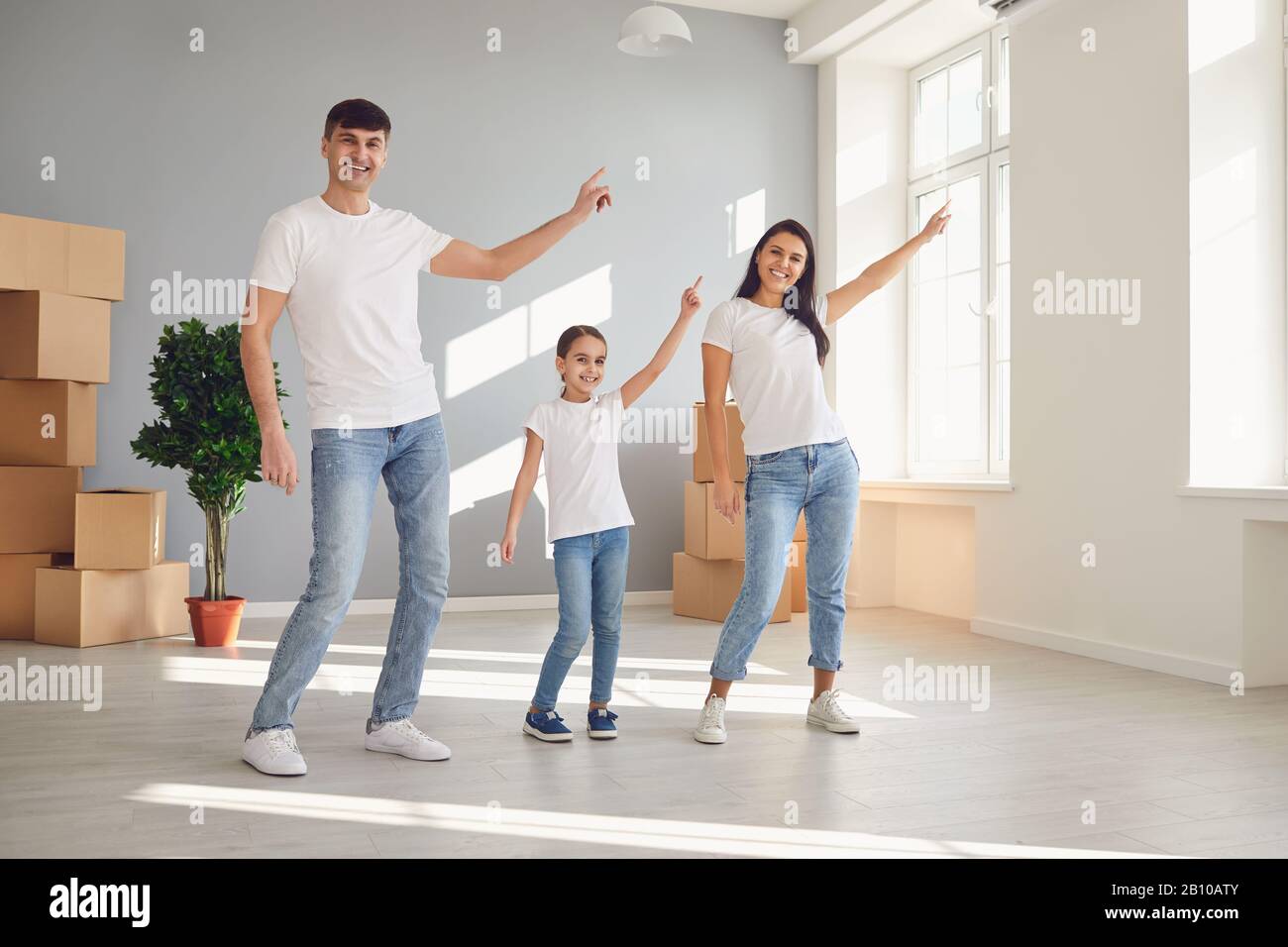Family moving house home apartment purchase rent mortgage sale room concept. Stock Photo