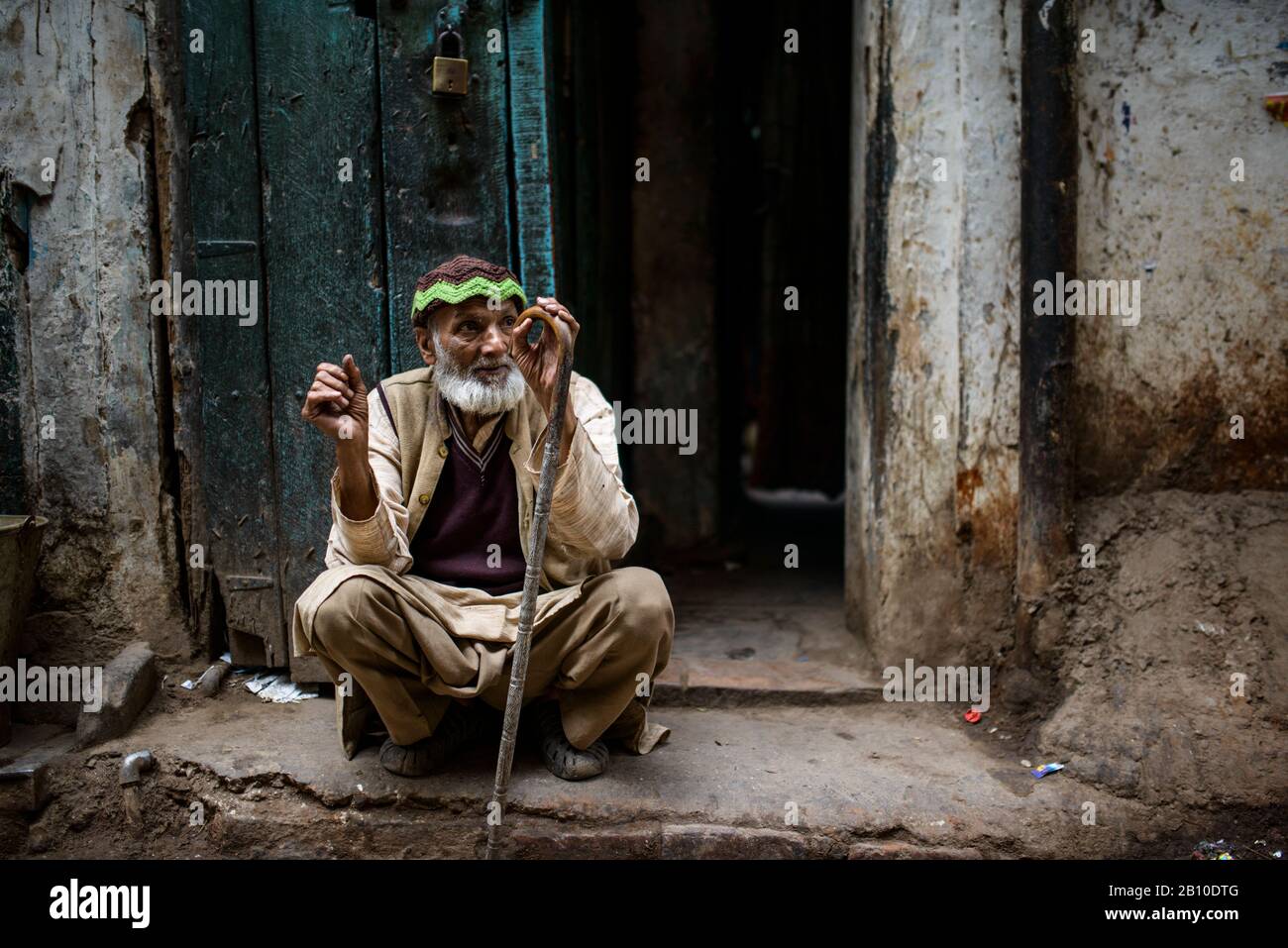 Old man in the streets of Old Delhi, India Stock Photo