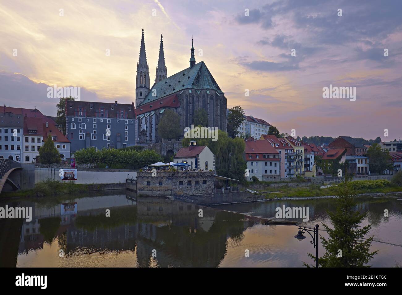 Bridge over the river Neisse to the old town with church St. Peter and Paul in Görlitz, Saxony, Germany Stock Photo