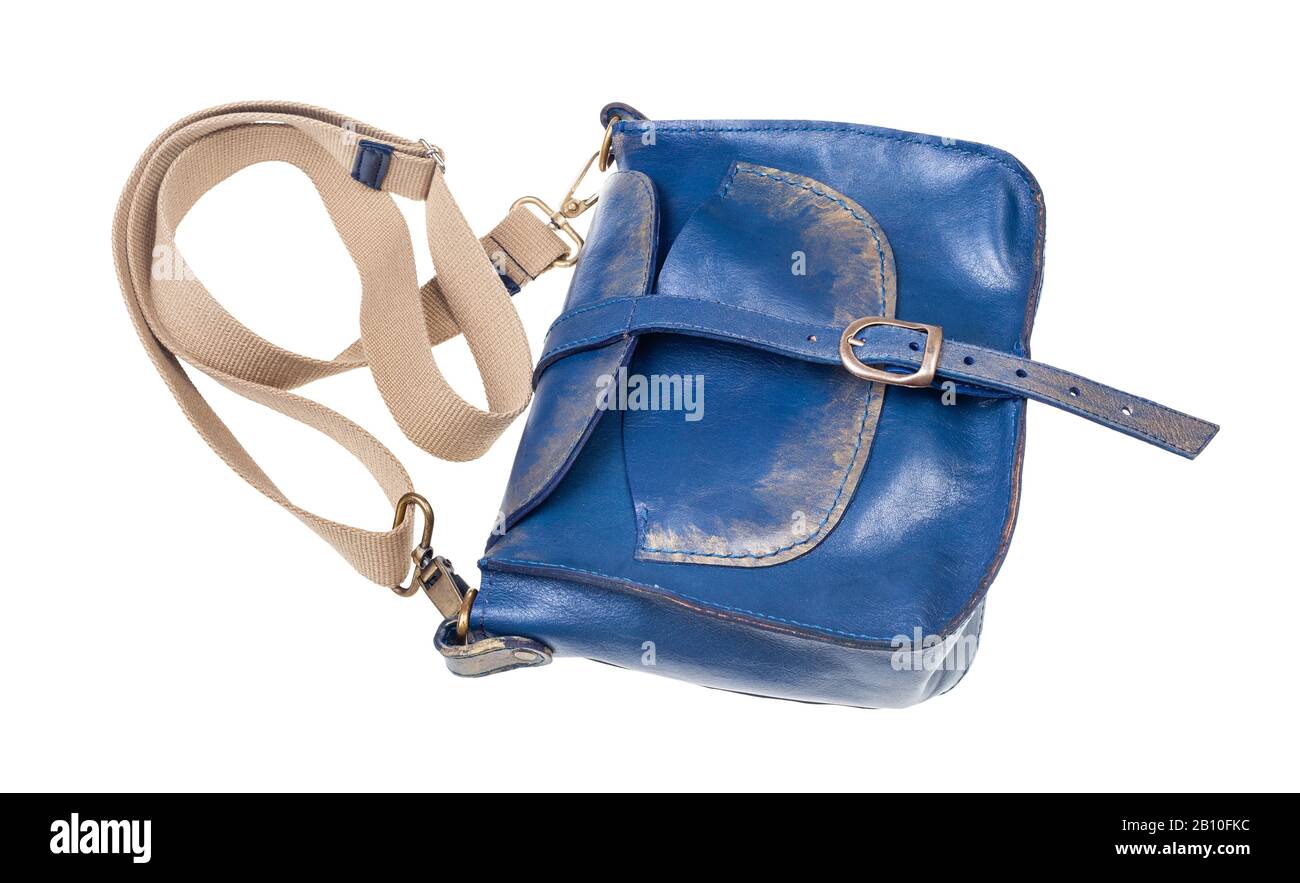 closed blue leather handbag with textile strap isolated on white background Stock Photo