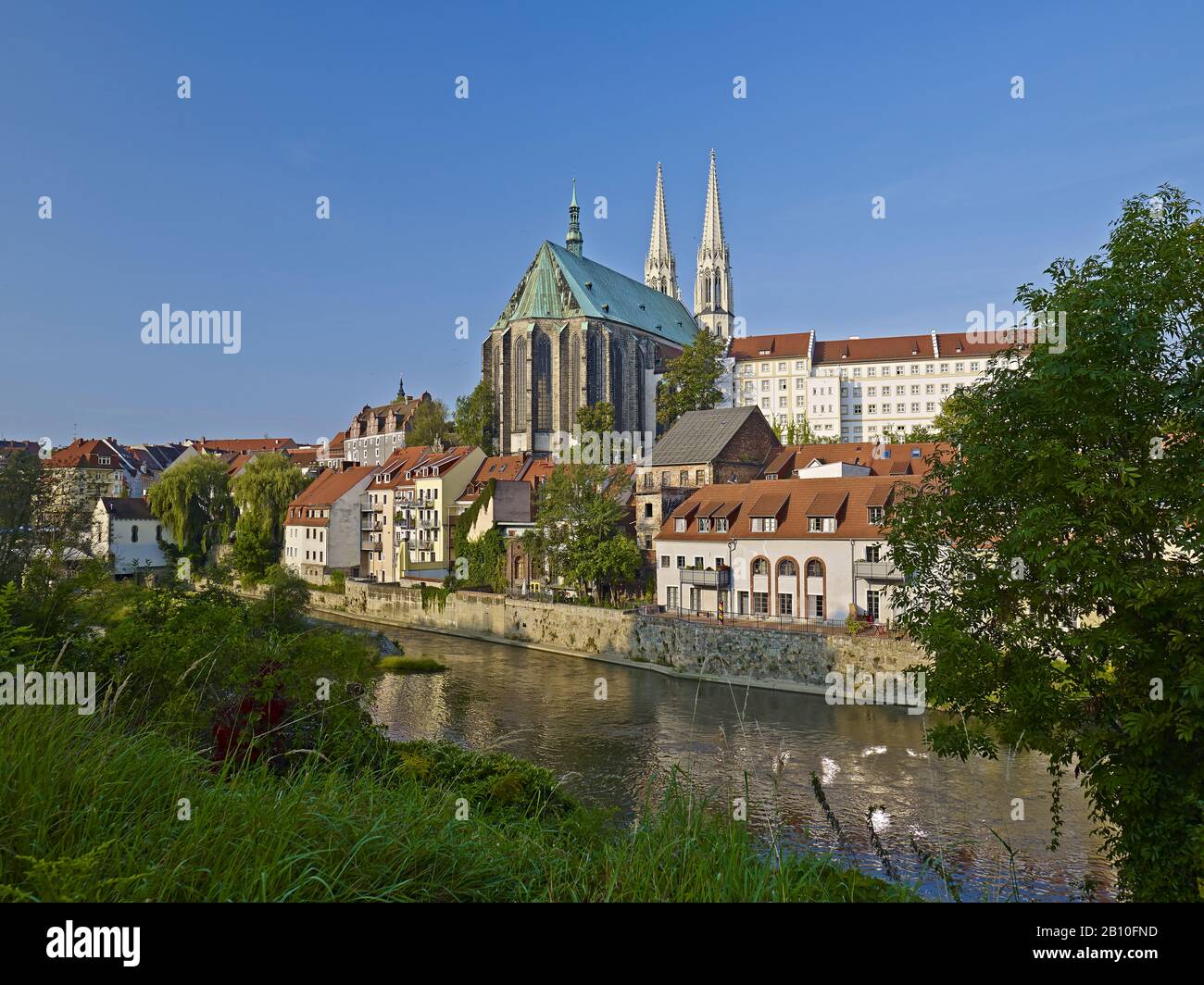 View over the river Neisse to the old town with church St. Peter and Paul in Görlitz, Saxony, Germany Stock Photo