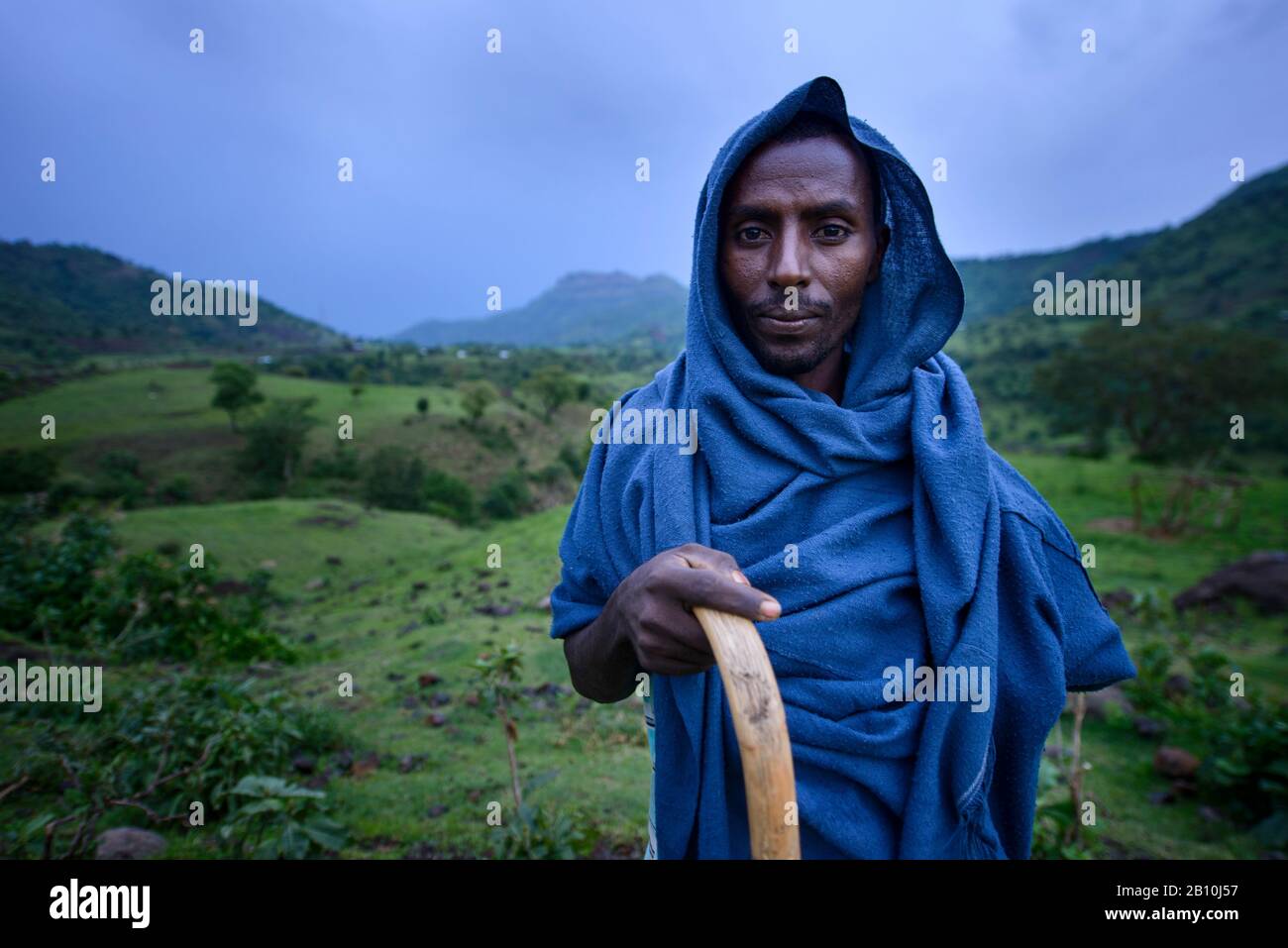 Ethiopian Orthodox Church priest wandering through the mountains, Ethiopia Stock Photo