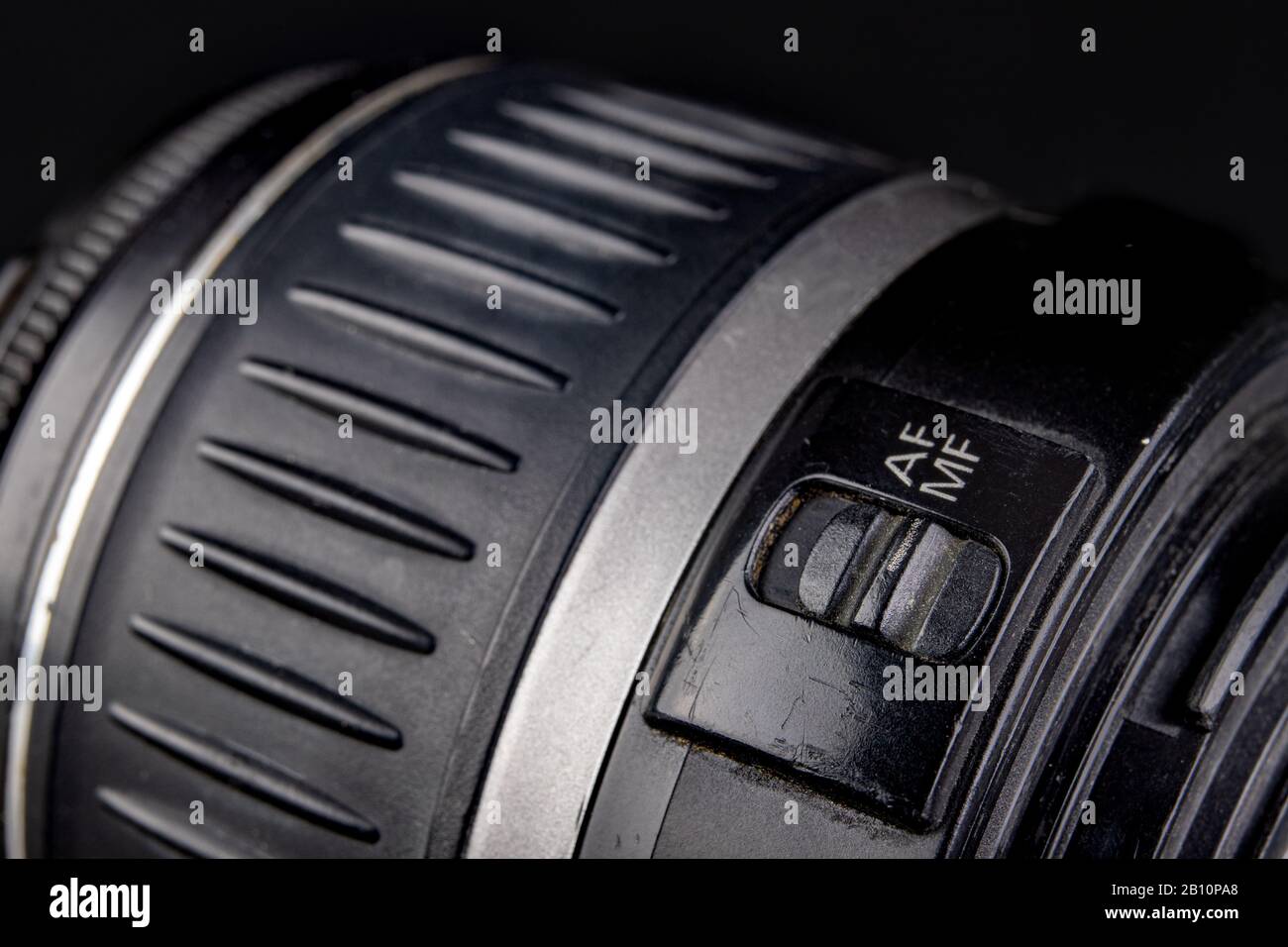 Slider for changing the autofocus mode. Buttons to change the lens mode