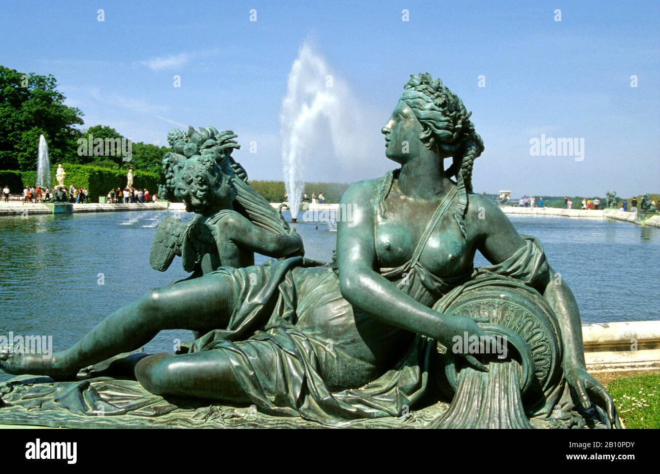 One of the sculptures on the Water Parterre pool , fountain at the Palace of Versailles, Paris, Yvelines, France Stock Photo