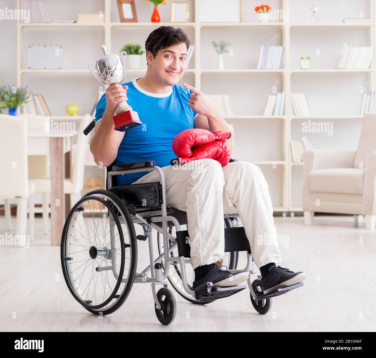 The disabled boxer at wheelchair recovering from injury Stock Photo Alamy