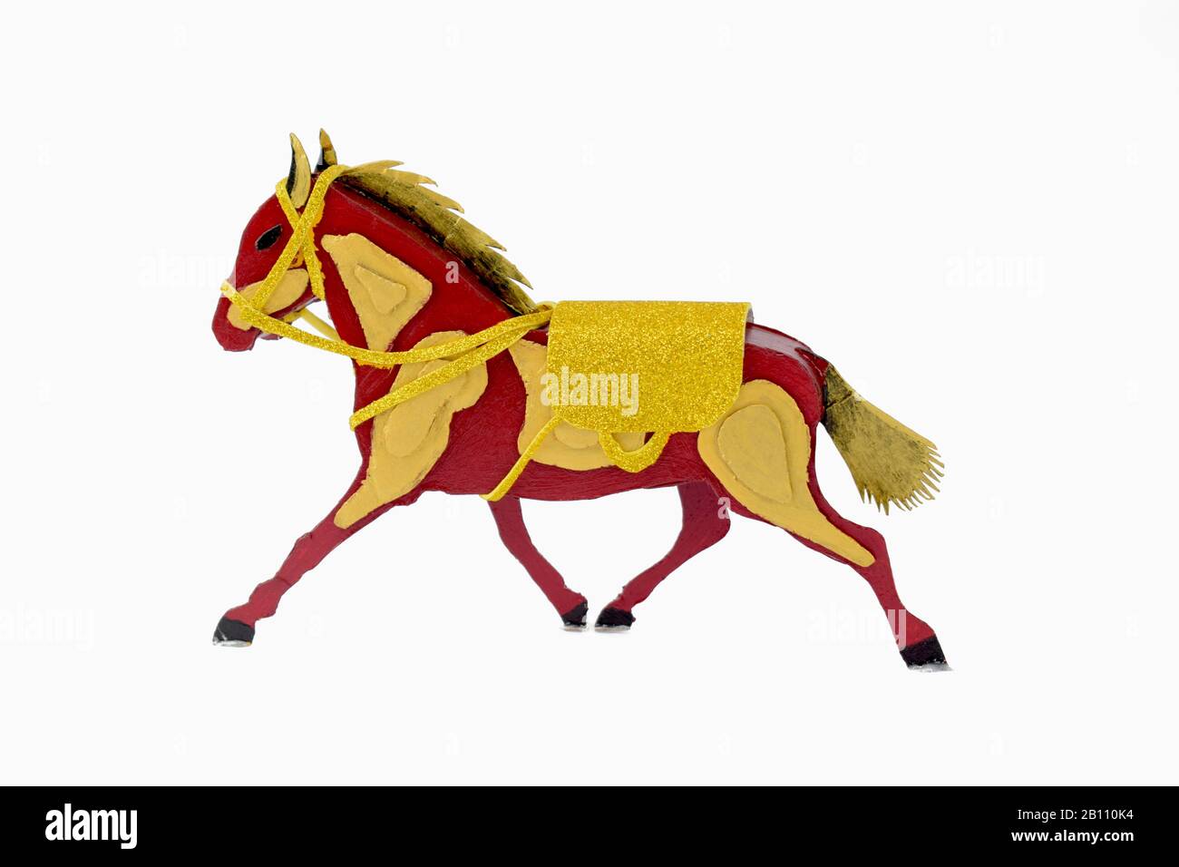 A crafted horse made of colorful cardboard displayed over an isolated white background Stock Photo