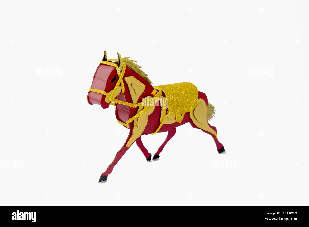 Horse craft made of cardboard cut out displayed over an isolated white background Stock Photo