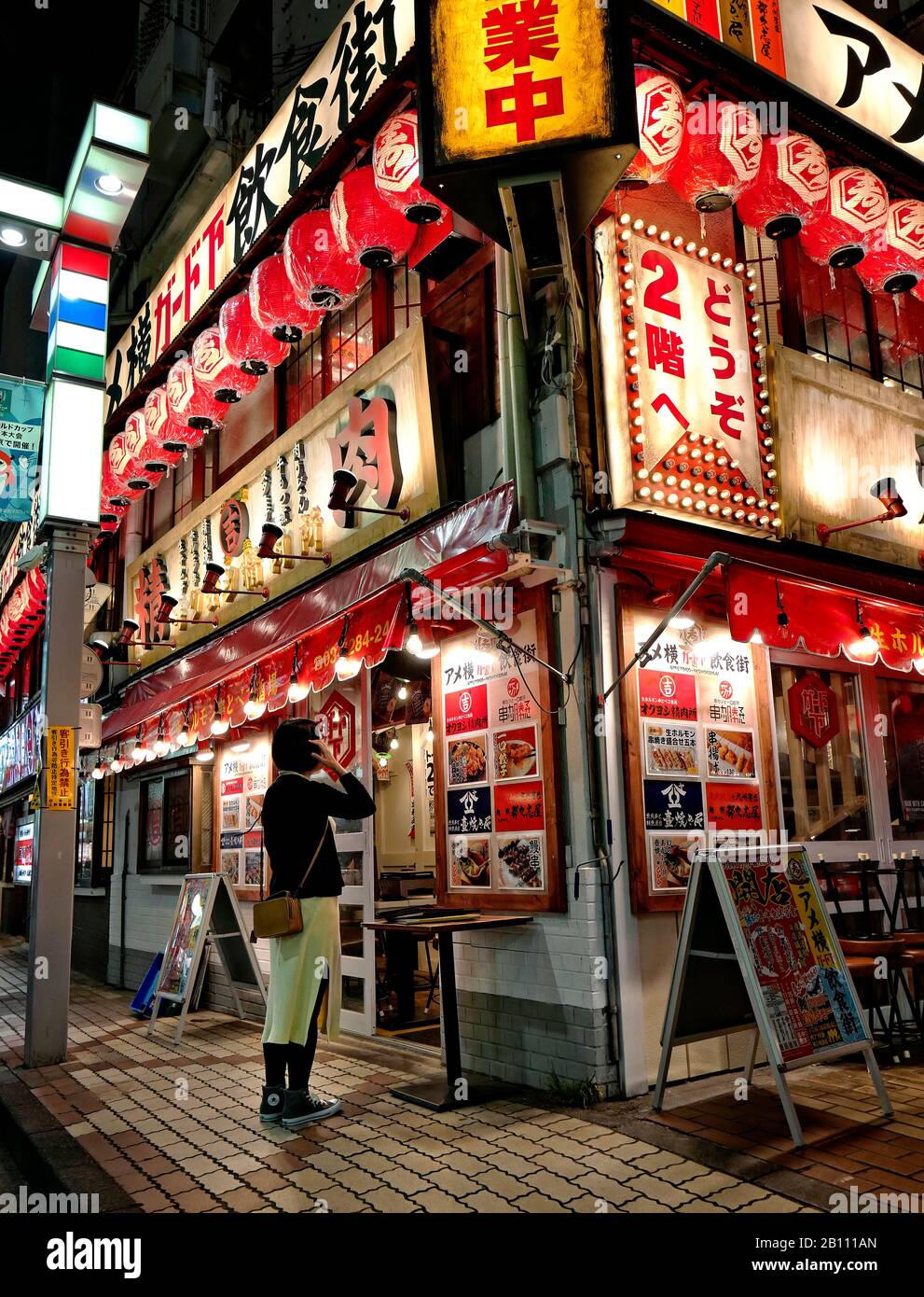 Japan, Honshu island, Kanto, Tokyo, by the streets of Ueno at night. Stock Photo