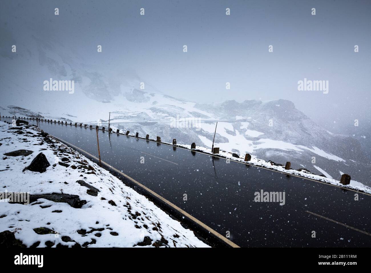 Grossglockner high alpine road in snowstorm, Austria Stock Photo