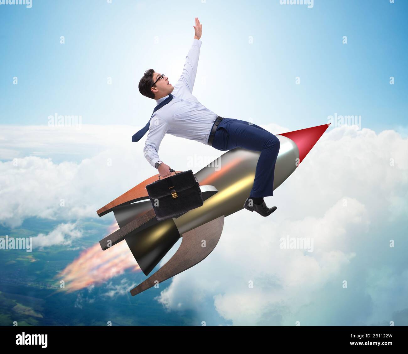The businessman flying on rocket in business concept Stock Photo - Alamy