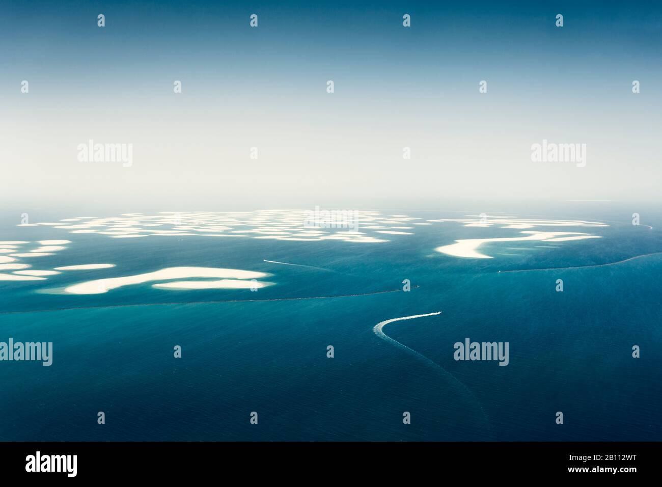 The World, artificial island off the coast of Dubai, UAE Stock Photo