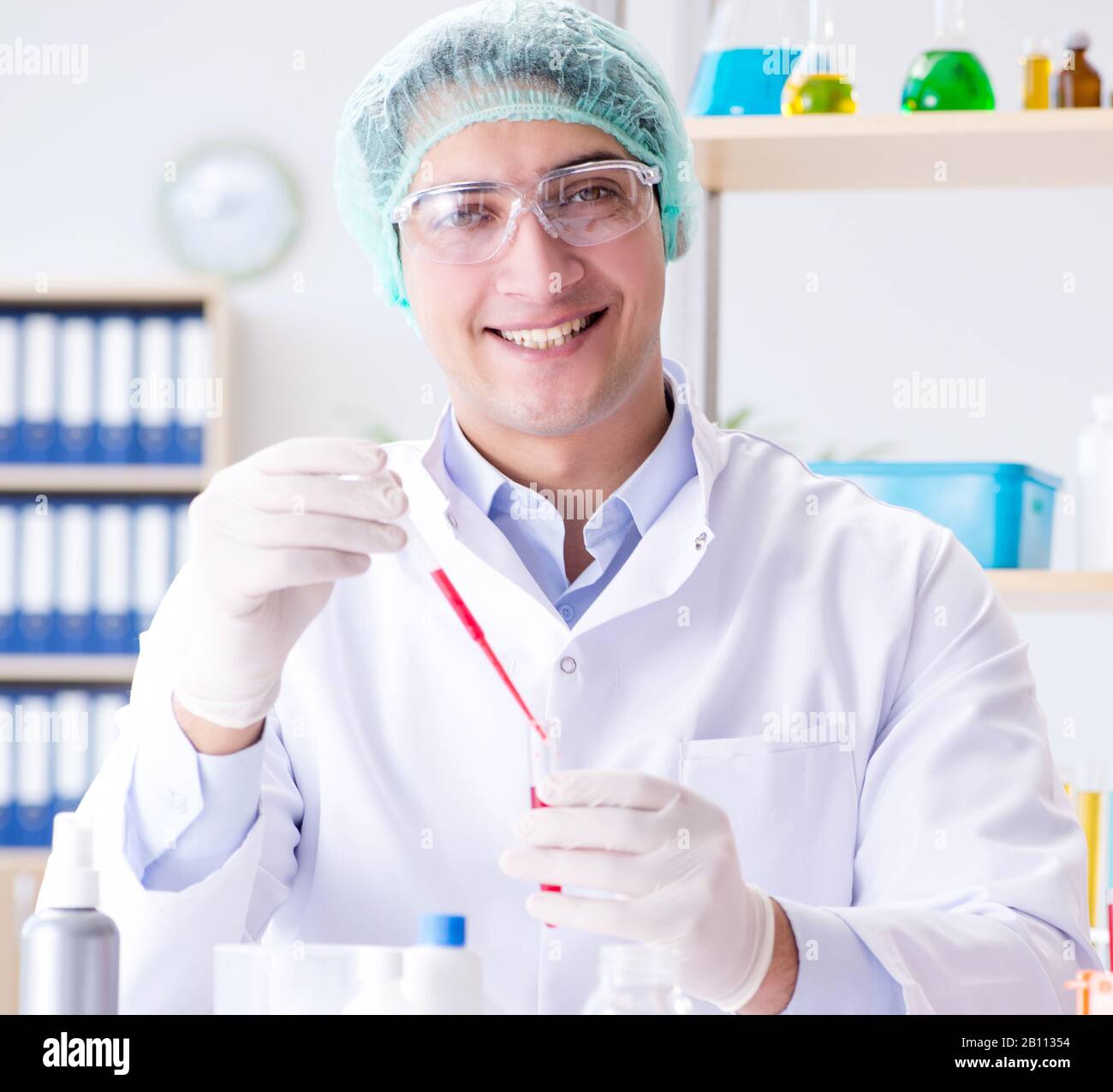 The blood testing in the lab with young scientist Stock Photo Alamy