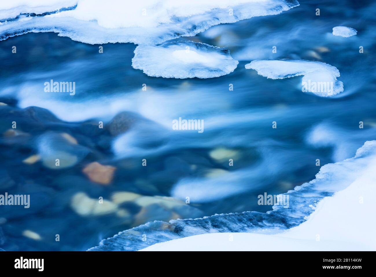 frozen brook with stones, Scandinavia, Lapland, Norrbotten, Abisko National Park Stock Photo