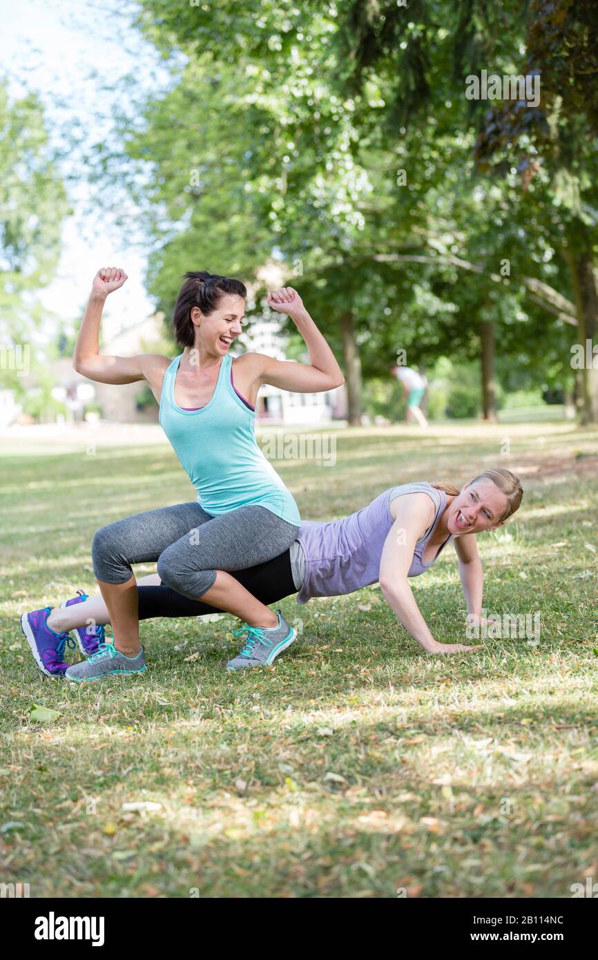 Two women doing strength training Stock Photo
