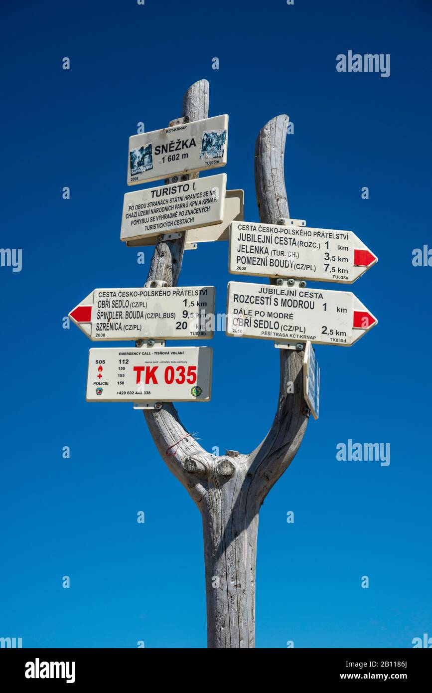 Hiking trail signs in Czech, at Polish–Czech border, at Snezka (Sniezka) summit in Krkonose (Karkonosze), Czech Republic and Poland Stock Photo