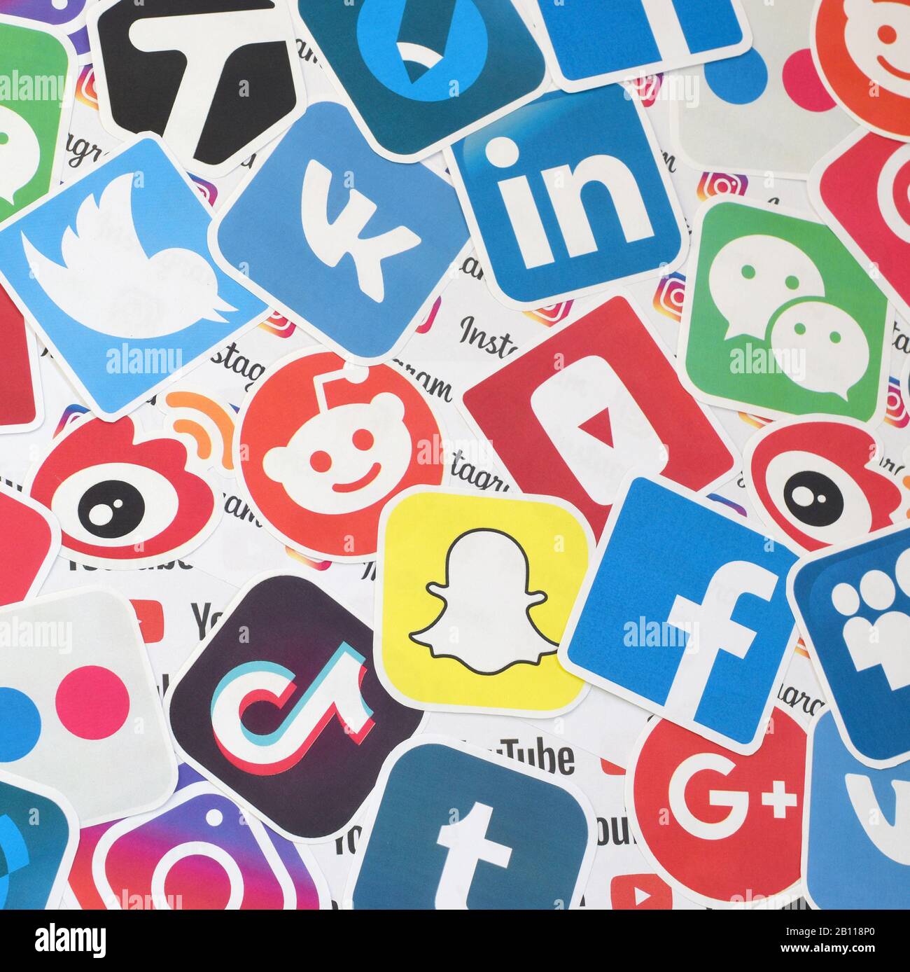 KHARKOV, UKRAINE - FEBRUARY 17, 2020: Many paper logos of popular social networks and internet resources. Colorful banner Stock Photo