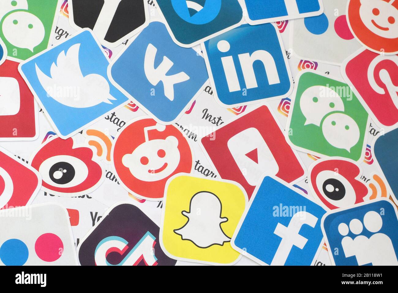 KHARKOV, UKRAINE - FEBRUARY 17, 2020: Many paper logos of popular social networks and internet resources. Colorful banner Stock Photo