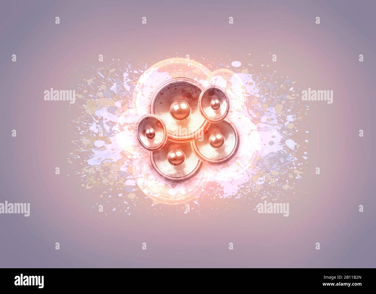 Audio speakers and paint splashes on a glowing background with vignette Stock Photo