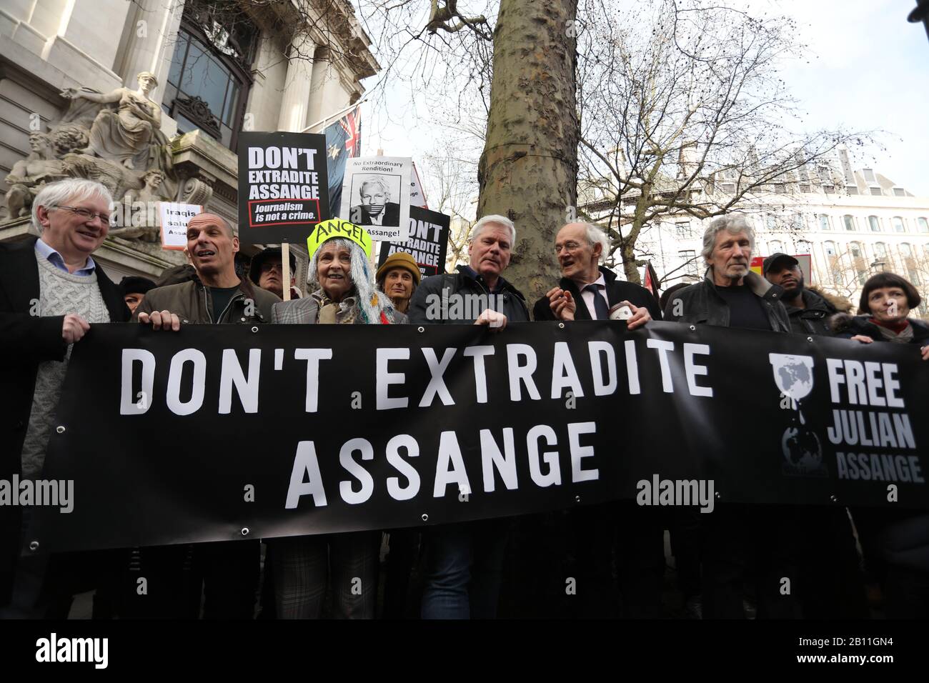 Supporters of Julian Assange, including Yanis Varoufakis (second left), Vivienne Westwood (centre), Assange's father Richard (second right) and Pink Floyd bassist Roger Waters (right), begin a march from Australia House to Parliament Square in London, protesting Assange's imprisonment and extradition. Stock Photo