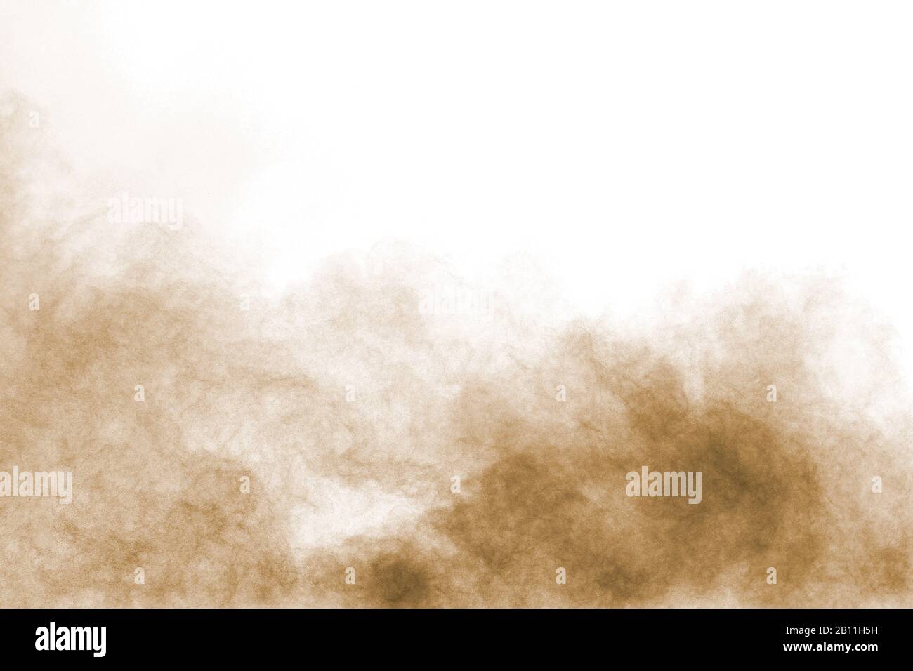 Brown dust cloud.Brown particles splattered on white background Stock