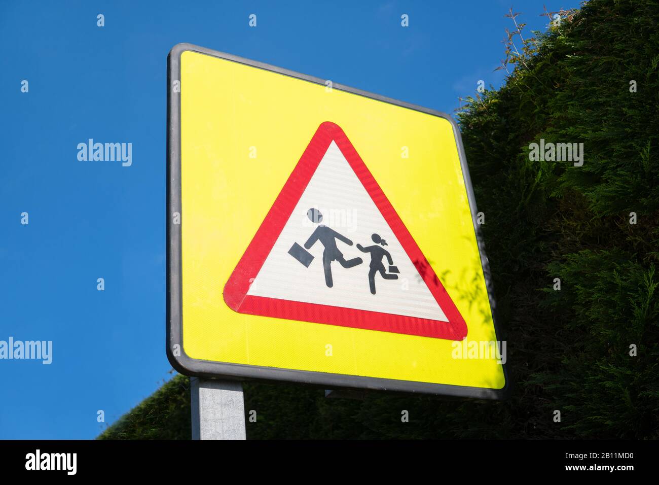 Colorful Beware of children in the school area sign. School warning sign Stock Photo