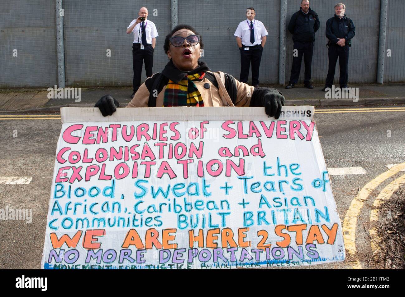 London, UK. 22nd Feb, 2020. A Campaigner demonstrate out side Harmondsworth detention centre in support of several people who are faceing deportation to Jamaica. Credit: Thabo Jaiyesimi/Alamy Live News Stock Photo