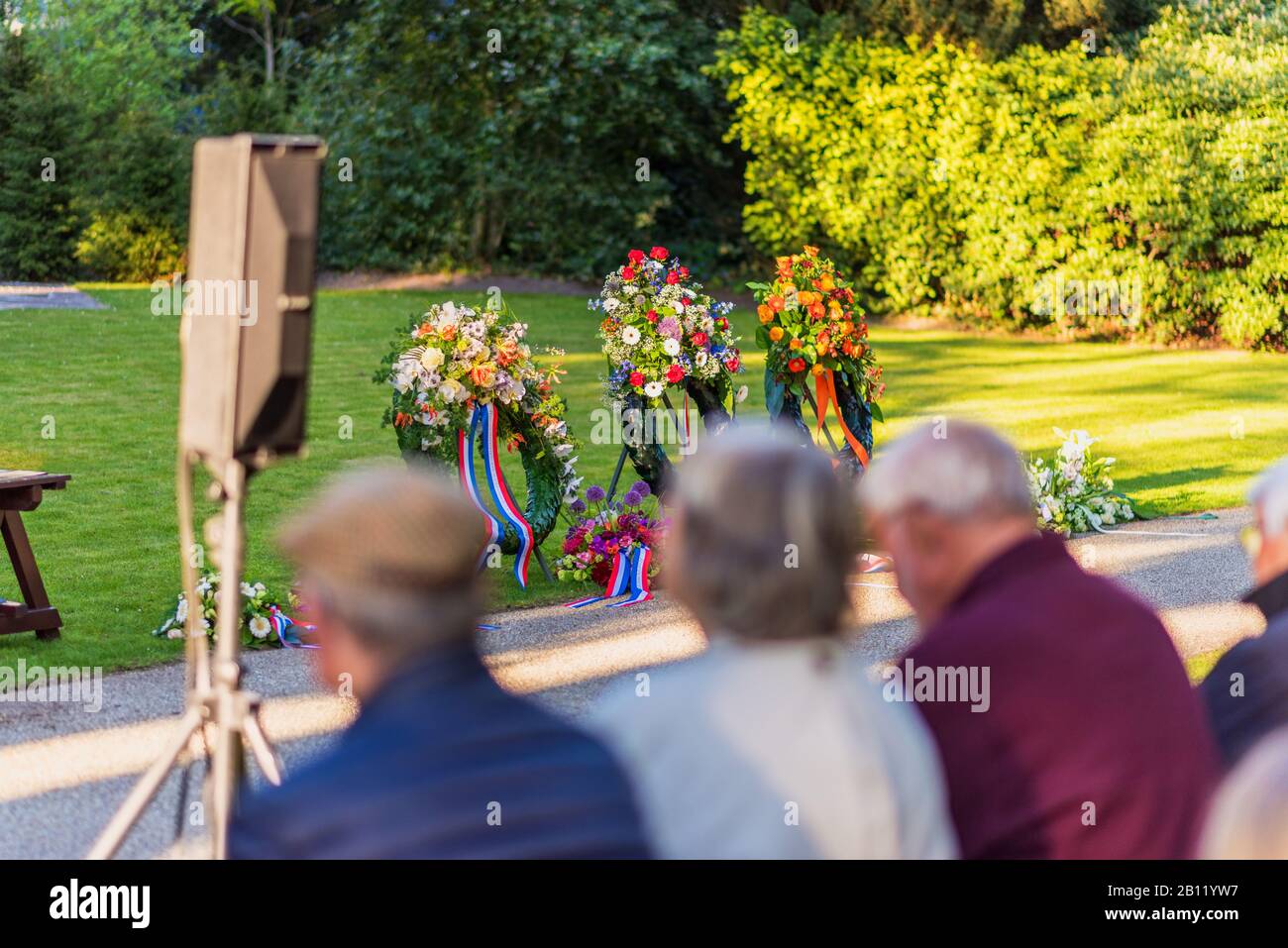 Flower Wreaths on Remembrance Day. Every year on May 4th at 8 PM all Dutch war casualties since World War 2 are commemorated during a 2 minute silence Stock Photo