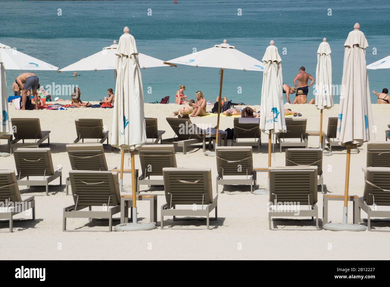 Sunbathing at JBR Beach, Dubai Stock Photo