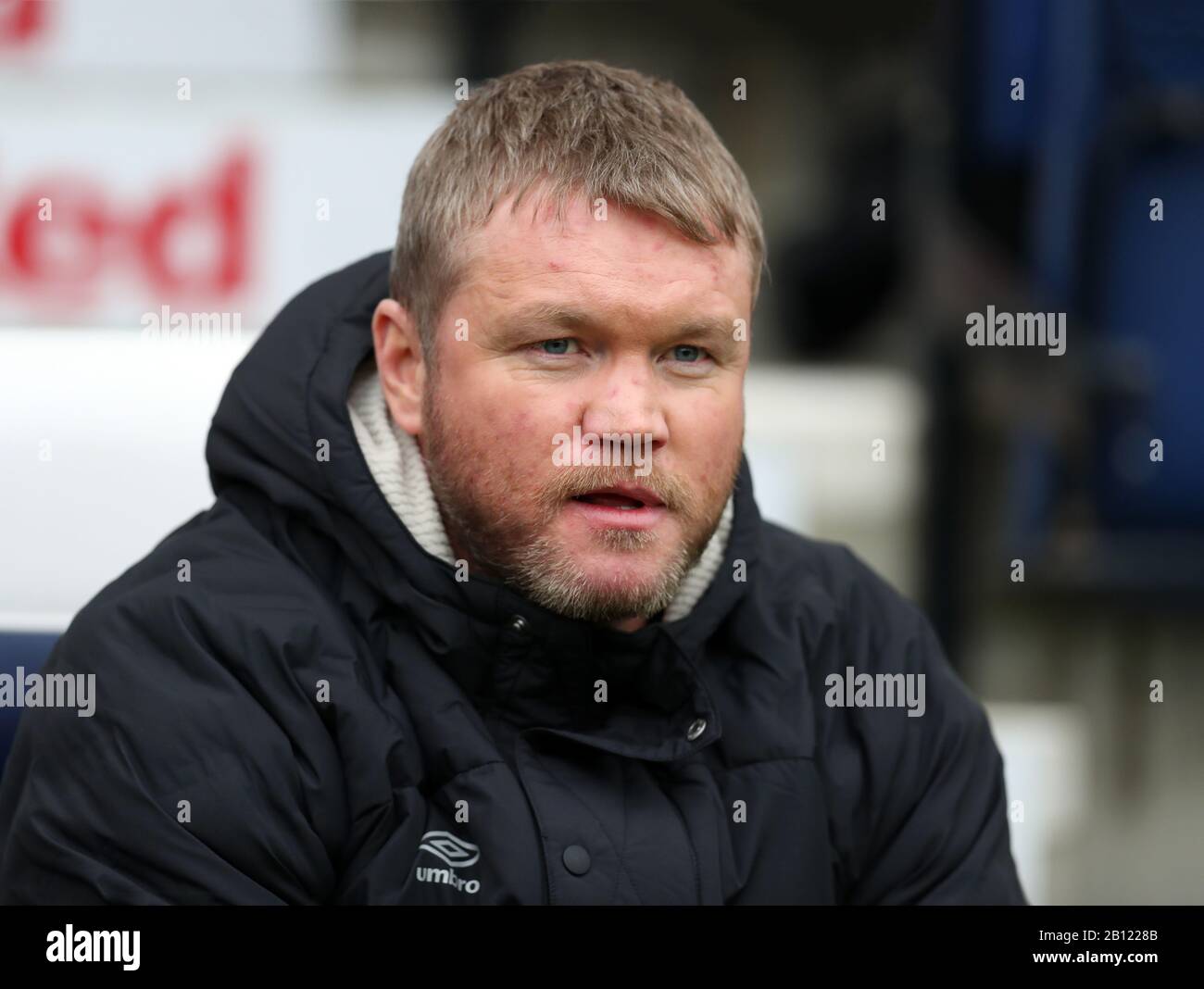 Deepdale Stadium, Preston, Lancashire, UK. 22nd Feb, 2020. English Championship Football, Preston North End versus Hull City; Hull City manager Grant McCann looks on from his seat in the dugout Credit: Action Plus Sports/Alamy Live News Stock Photo