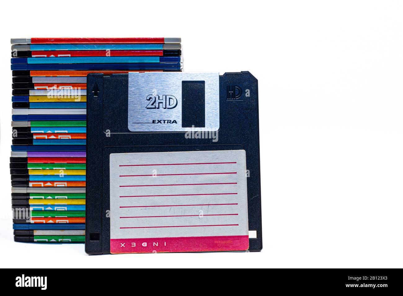 numerous black floppydisks lined up on a white background Stock Photo