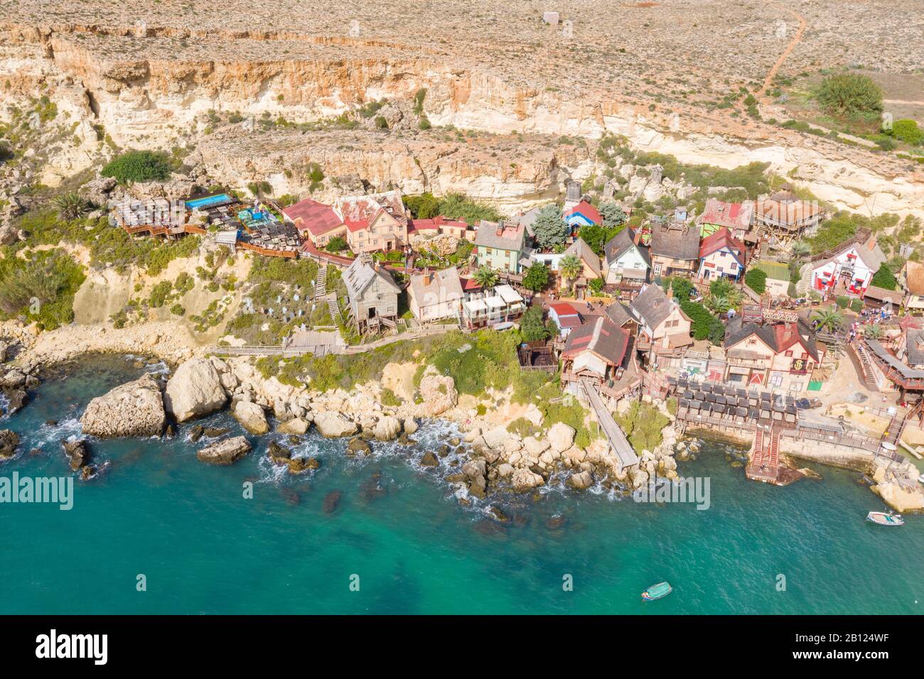 Top view of famous tourist attraction Popeye village, also known as Sweethaven village. Sunny day, blue sea. Mellieha city. Malta country Stock Photo