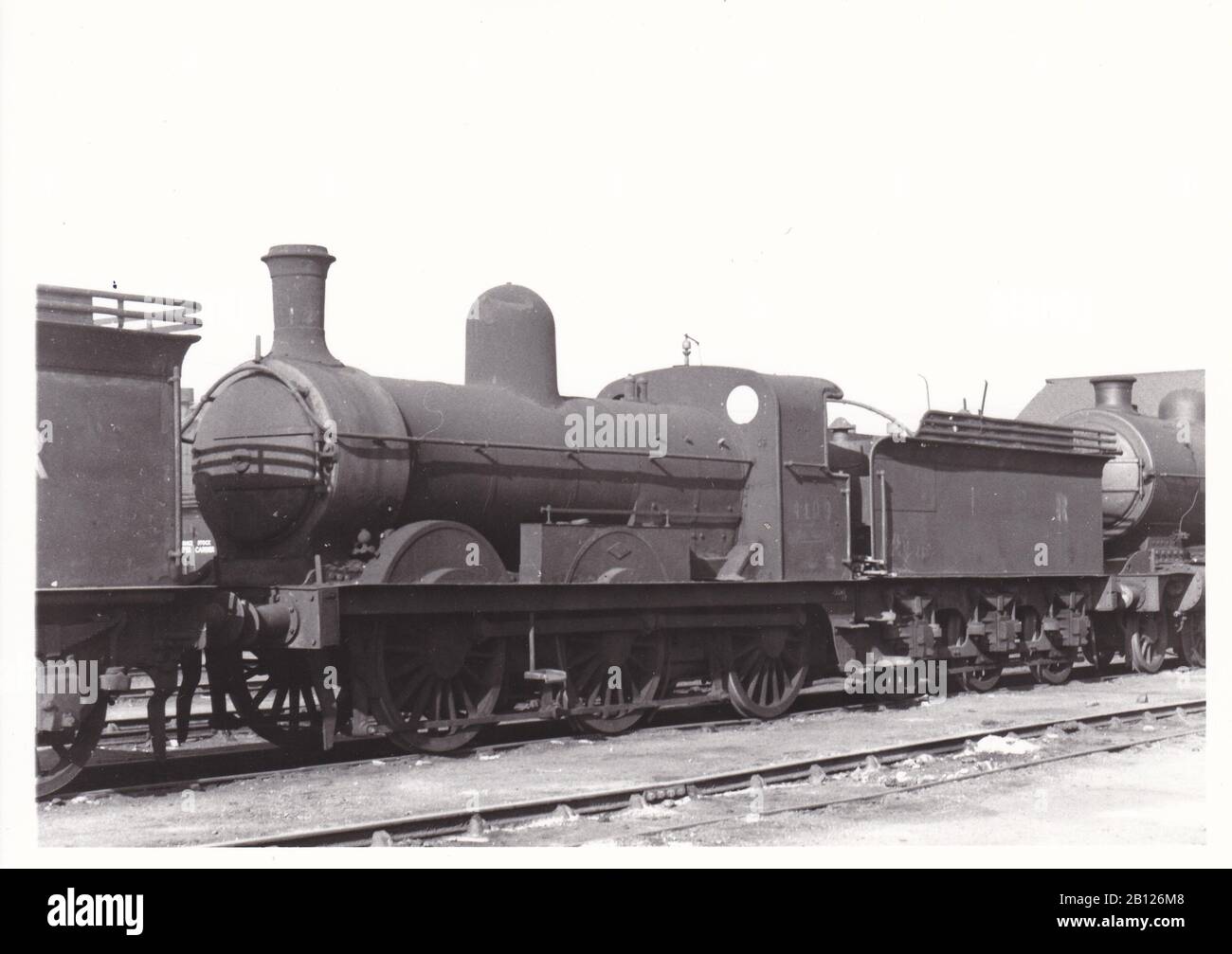 Vintage black and white photo of steam locomotive train - L.N.E.R Ex G.N.R.  Class J4 0-6-0 4109 at Doncaster Works January 1951. Stock Photo
