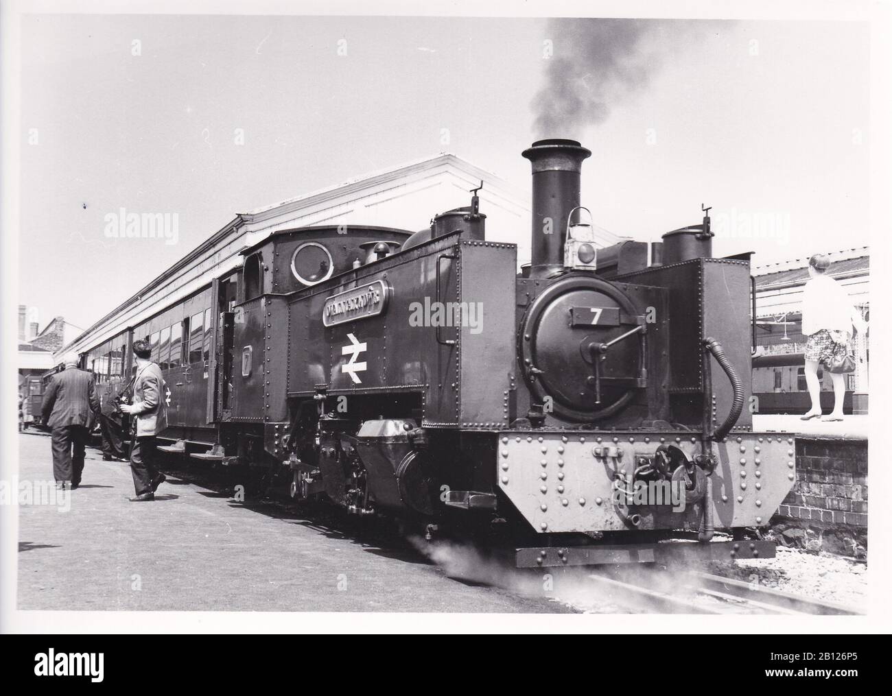 Vintage black and white photo of steam locomotive train - B.R. Vale of Rheidol 2-6-2T 7 Owain Glyndwr on a devils bridge train at Aberystwyth May 1968. Stock Photo