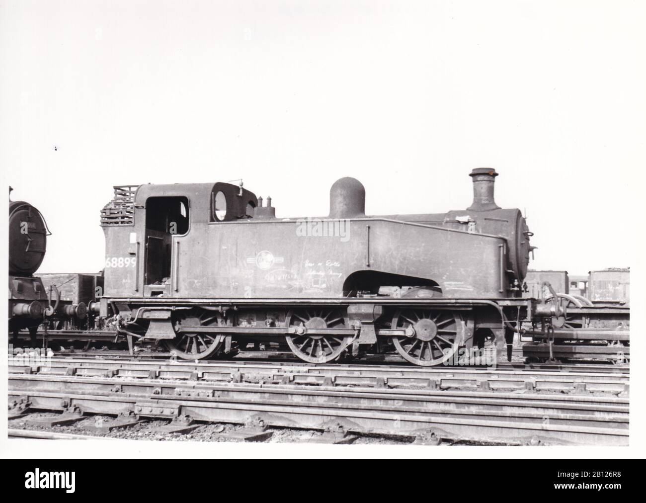 Vintage black and white photo of steam locomotive train - E.R Class J50/1 0-6-0T 68899 at Stratford October 1960. Stock Photo