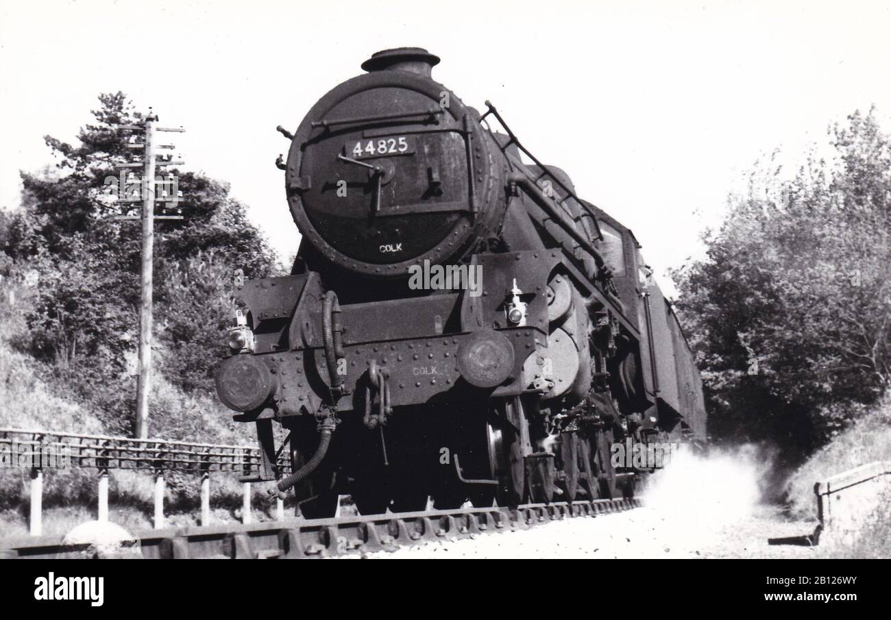 Vintage black and white photo of steam locomotive train - 44825 through Chilterns between Amersham and Great Missenden on the Marylebone - Nottingham. Stock Photo