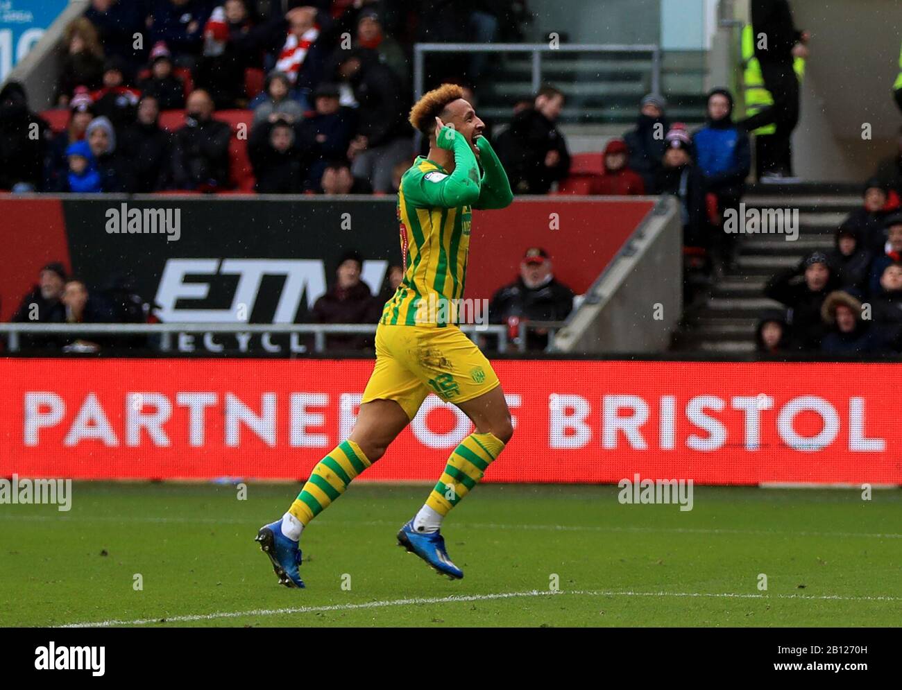 West Bromwich Albion's Callum Robinson celebrates scoring his side's first goal of the game during the Sky Bet Championship match at Ashton Gate, Bristol. Stock Photo