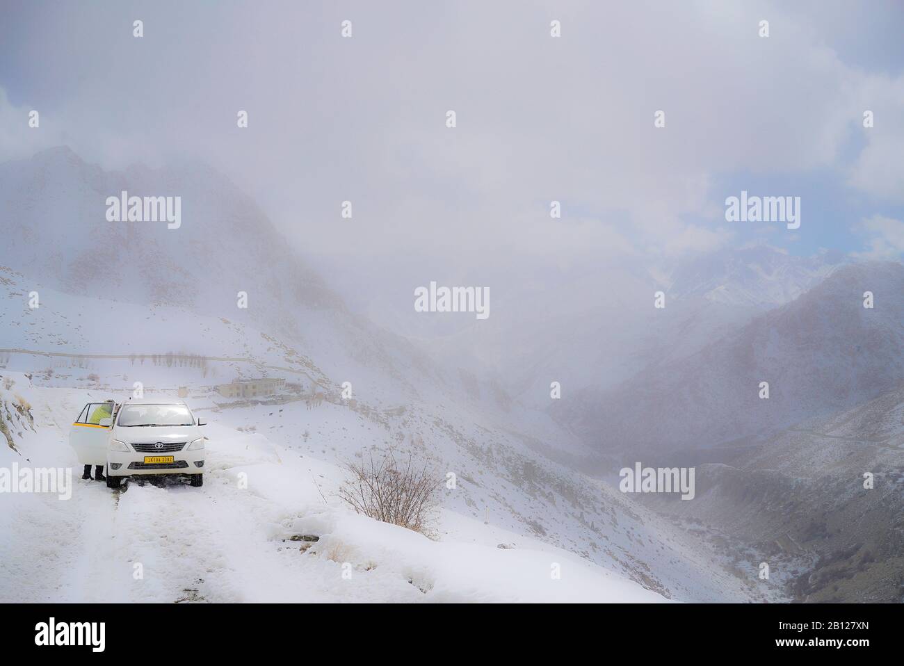 Tourist expedition searching snow leopard in Ulley valley. Ladakh ...