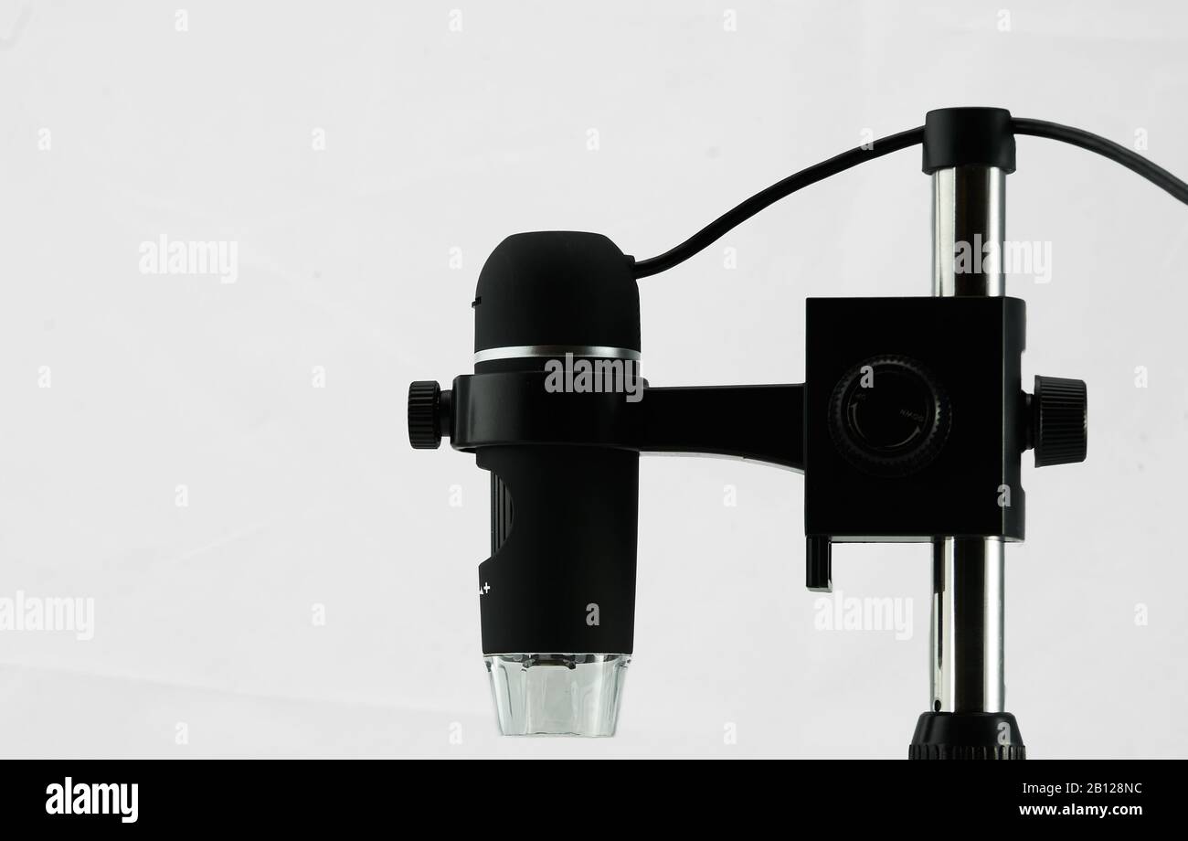 USB microscope, side view against white background Stock Photo