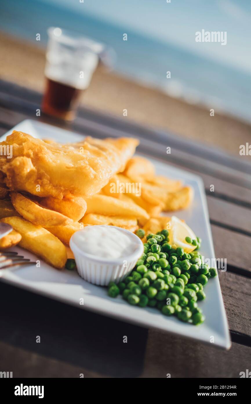 Fish and chips, typical British lunch, restaurant on the beach