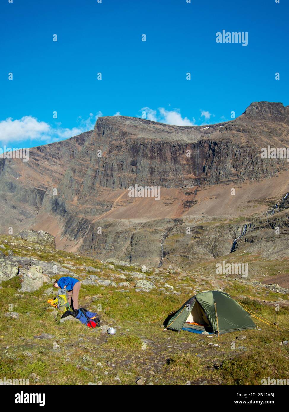 Woman at the campsite in the wilderness of swedish lapland Stock Photo