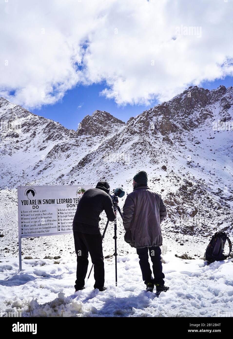 Tourist expedition searching snow leopard in Ulley valley. Ladakh ...